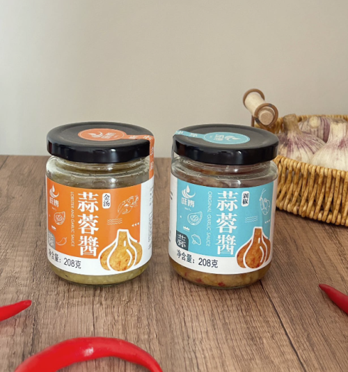尚赢调味品重磅推出“味博蒜蓉酱”，引领夏日蒜蓉美食新风尚——精选山东紫皮大蒜，慢火熬制，双味可选，解锁蒜蓉自由——